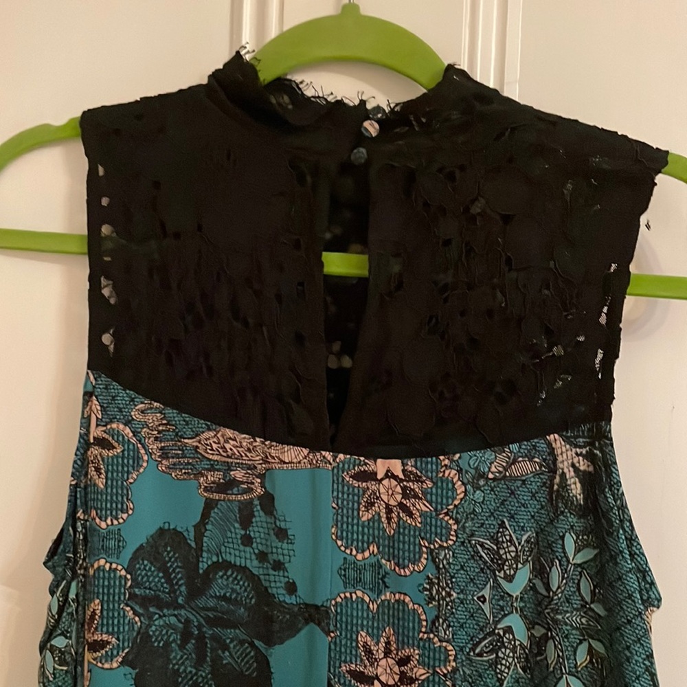 Great Print and Lace Appliqué from Anthropology. Silk blend swing dress.